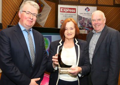 Pat Somers ( Editor, Leinster Express) , presenting the Environment Award to Mary White and John Joe Fennelly (Abbeyleix Tidy Towns)